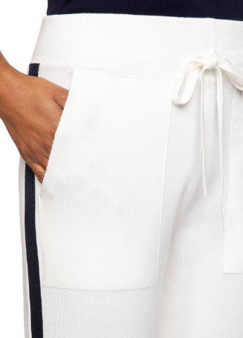 Белые спортивные демисезонные зауженные брюки United Colors of Benetton