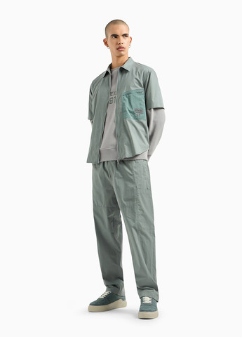 Серый свитшот Armani Exchange однотонный вышивка (303807693)