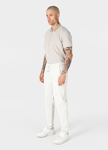 Белые кэжуал демисезонные зауженные брюки Colin's
