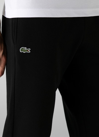 Черные кэжуал демисезонные прямые брюки Lacoste