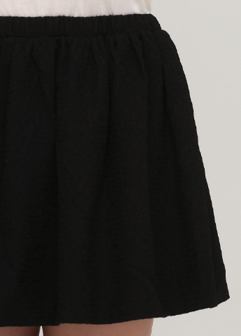 Черная кэжуал однотонная юбка Suncoo Paris клешированная