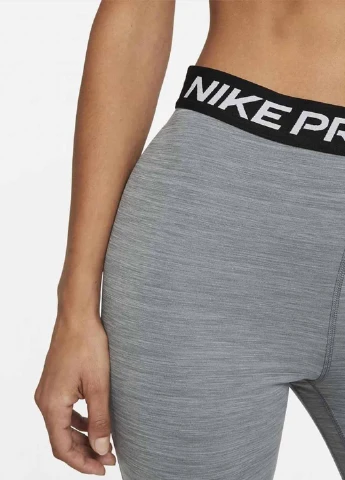 Серые демисезонные леггинсы da0483-084 Nike