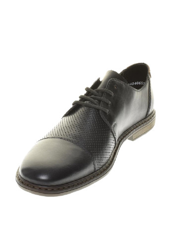 Черно-белые классические туфли Rieker на шнурках