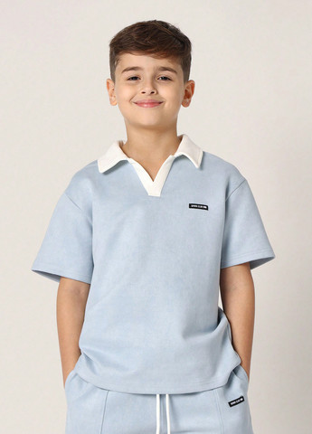 Светло-голубой летний костюм (поло, шорты) с шортами SHEIN