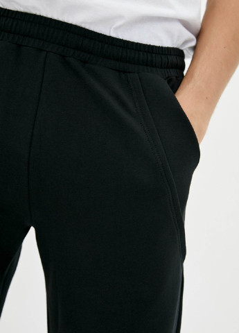 Черные спортивные демисезонные зауженные брюки Promin
