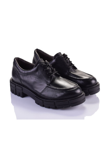 Черные женские туфли на низком каблуке - фото