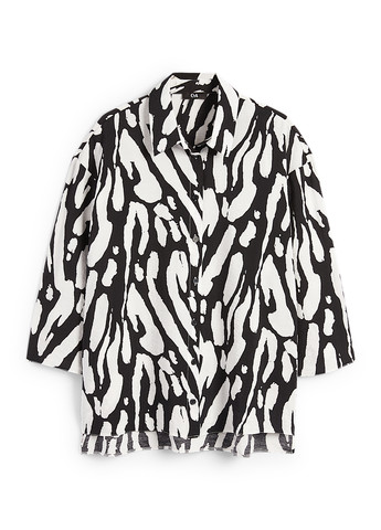 Чорно-біла блуза C&A