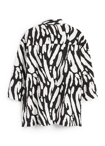 Чорно-біла блуза C&A