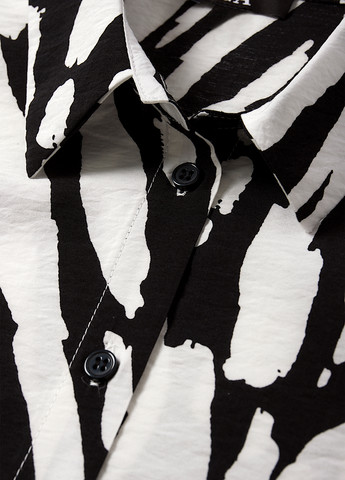 Чорно-біла блуза C&A