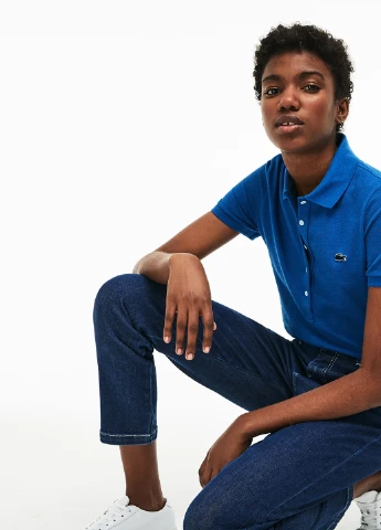 Светло-синяя женская футболка-поло Lacoste с логотипом