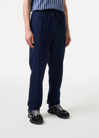 Темно-синие спортивные демисезонные прямые брюки Lacoste