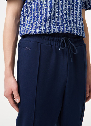 Темно-синие спортивные демисезонные прямые брюки Lacoste