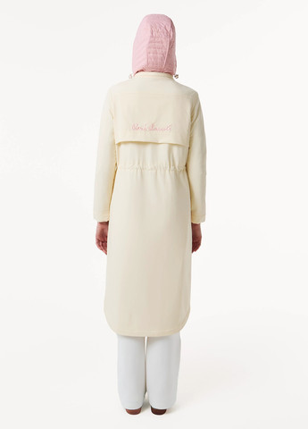 Бежевая зимняя куртка Lacoste