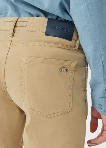 Песочные кэжуал демисезонные зауженные брюки Lacoste