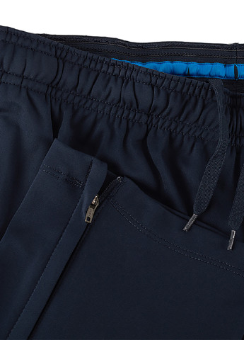 Темно-синие спортивные демисезонные зауженные брюки Nike