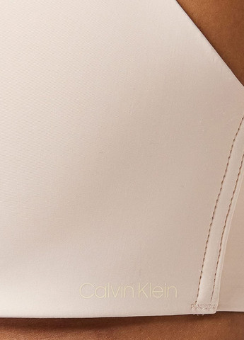 Бежевый бесшовный бюстгальтер Calvin Klein без косточек нейлон
