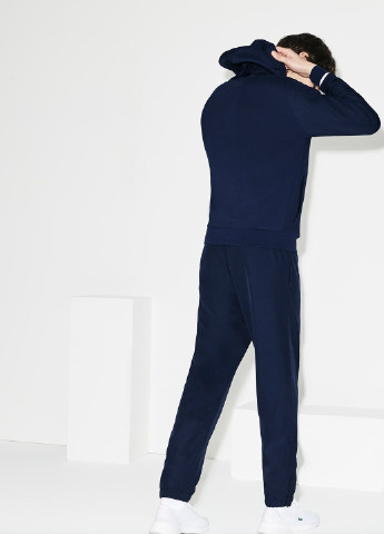 Темно-синий демисезонный костюм (кофта, брюки) брючный Lacoste