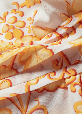 Світло-оранжева кежуал сукня кльош C&A з квітковим принтом