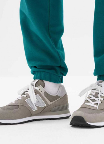 Зеленые спортивные демисезонные джоггеры брюки New Balance