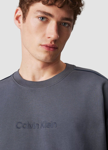 Серый свитшот Calvin Klein однотонный вышивка (366292643)