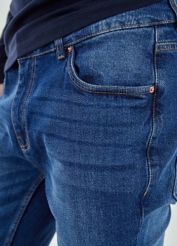 Синие демисезонные зауженные джинсы Piazza Italia