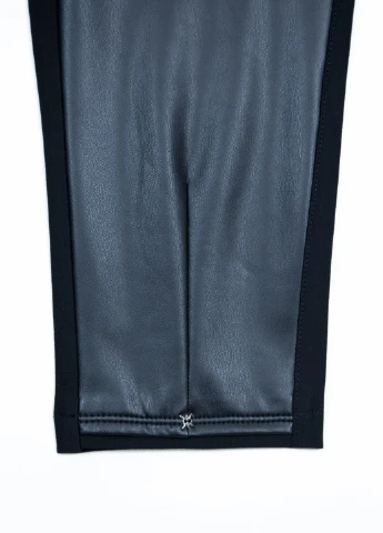 Штани жіночі шкірозамінник і трикотаж чорні Estensivo Slouchy (251839593)