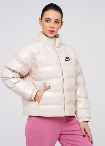 Молочна зимня куртка Nike