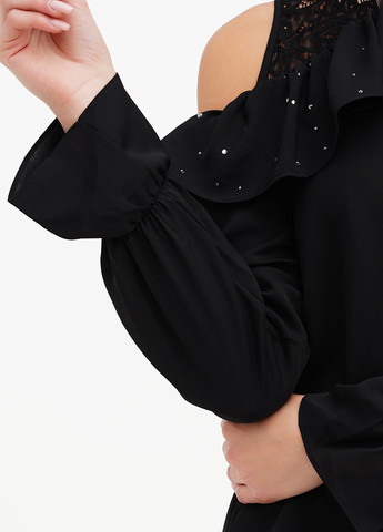 Чорна блуза Sassofono