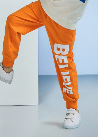 Оранжевые кэжуал, спортивные демисезонные брюки джоггеры SHEIN