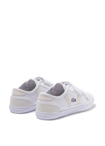 Белые кеды Lacoste