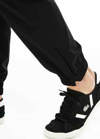 Черные спортивные, кэжуал демисезонные зауженные брюки Lacoste