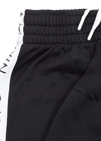 Чорний демісезонний костюм (олімпійка, брюки) брючний Nike G NSW TRK SUIT TRICOT