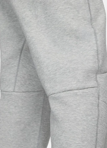 Серые спортивные демисезонные зауженные брюки Nike
