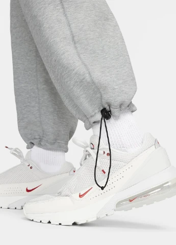 Серые спортивные демисезонные зауженные брюки Nike