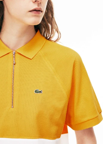 Желтая женская футболка-поло Lacoste однотонная