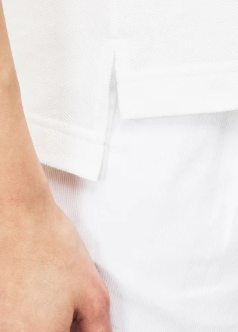 Желтая женская футболка-поло Lacoste однотонная