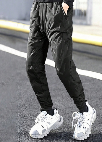 Черные спортивные зимние брюки джоггеры SHEIN