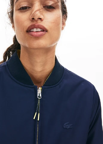 Темно-синяя демисезонная куртка Lacoste