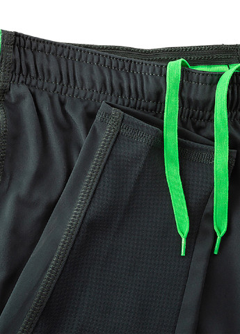 Темно-зеленые спортивные демисезонные зауженные брюки Nike