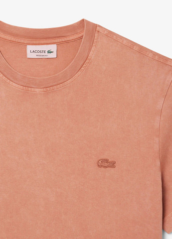 Светло-оранжевая футболка Lacoste