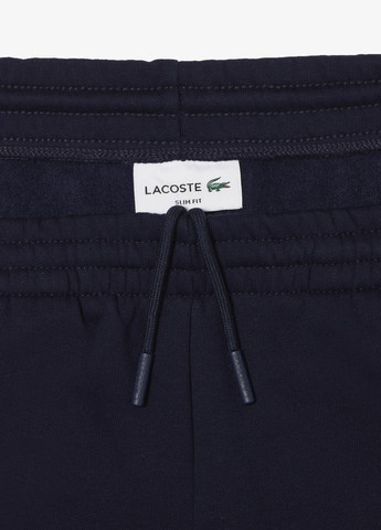Темно-синие кэжуал демисезонные джоггеры брюки Lacoste