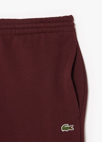 Бордовые спортивные демисезонные джоггеры брюки Lacoste