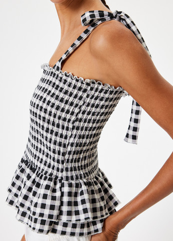 Чорно-біла блуза з баскою KOTON