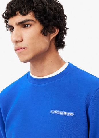 Темно-синій світшот Lacoste однотонний нашивки (329694518)