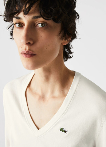 Молочный демисезонный пуловер пуловер Lacoste