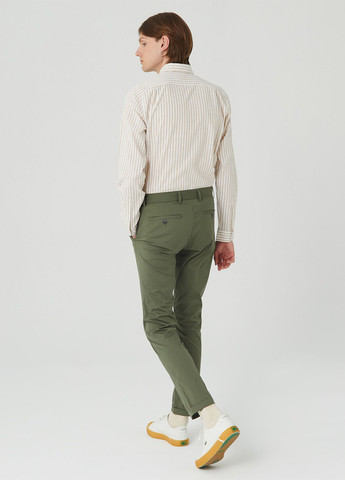 Зеленые кэжуал демисезонные чиносы брюки Lacoste