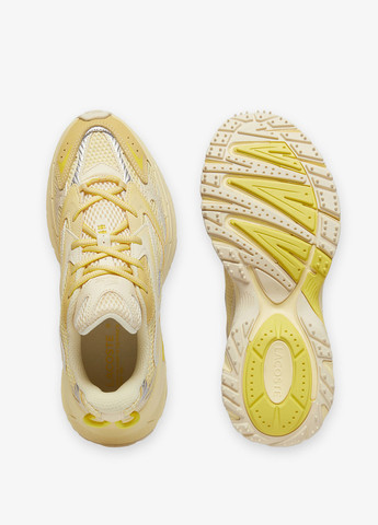 Желтые демисезонные кроссовки Lacoste
