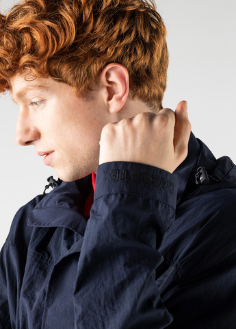 Темно-синяя демисезонная куртка Lacoste