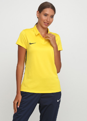 Желтая женская футболка-поло Nike