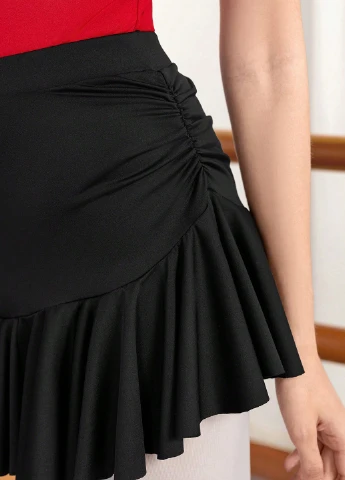 Черная спортивная однотонная юбка SHEIN клешированная